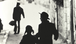Man and girl on street