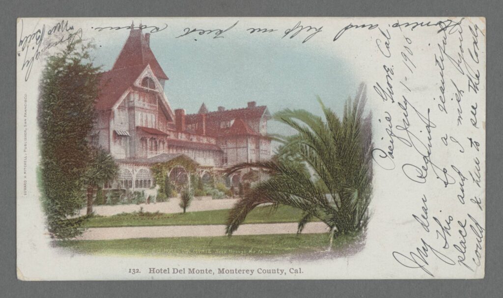 Front (picture side) of a color postcard, circa 1898, of large Victorian resort hotel, with writing around the sides of the image