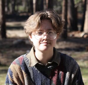Shannon White in front of trees